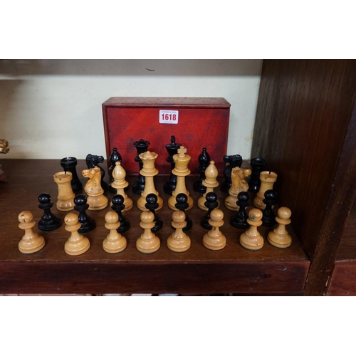 1618 - A boxwood and ebonized Staunton pattern chess set, king 9.4cm, pawn 4.9cm, in stained wood box.... 