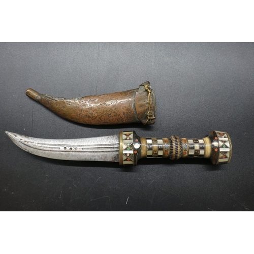 1725 - A small kukri and scabbard; together with two other eastern knives. 