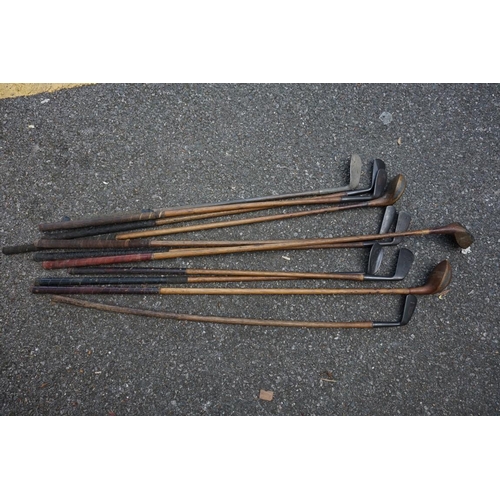 1833 - An old bag of ten vintage golf clubs, to include Scottish examples.