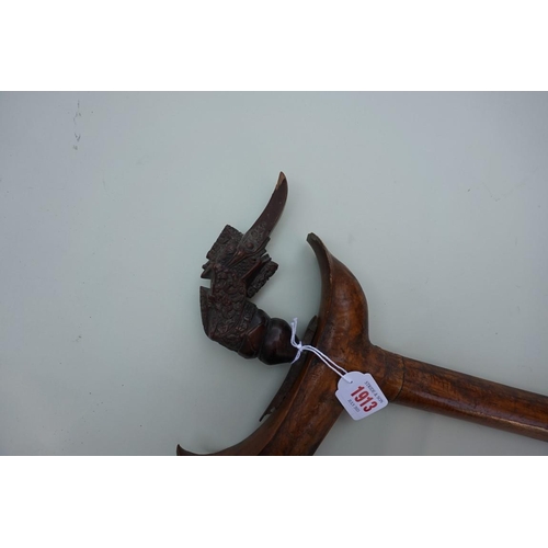 1913 - A good Indonesian 'kingfisher' kris and wood sheath, probably Java, with 38cm blade and finely carve... 