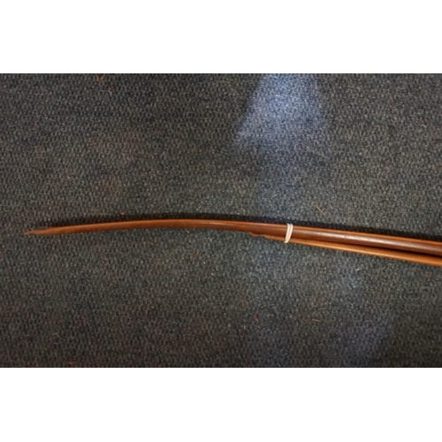 1917 - Toxophily: an old yew bow, 160cm long; together with another smaller example; and twelve old arrows,... 