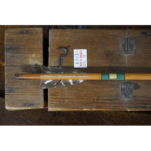 1917 - Toxophily: an old yew bow, 160cm long; together with another smaller example; and twelve old arrows,... 