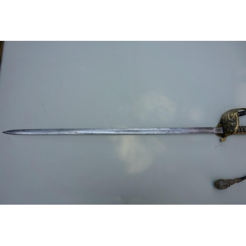 1922 - An antique navy officer's dress sword and scabbard, by Gieves.