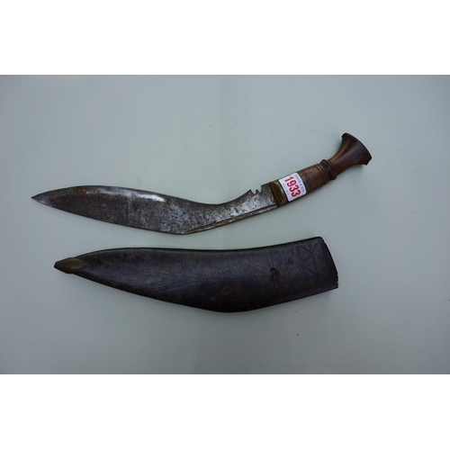 1933 - An old kukri and leather sheath.
