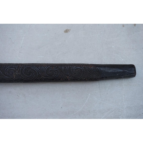 1944 - Ethnographica: an unusual Maori tribal carved wood staff or stick, carved all over with stylized dec... 