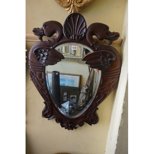 1839 - An unusual antique carved walnut framed wall mirror, the egg shaped plate flanked by dodos, 76 ... 