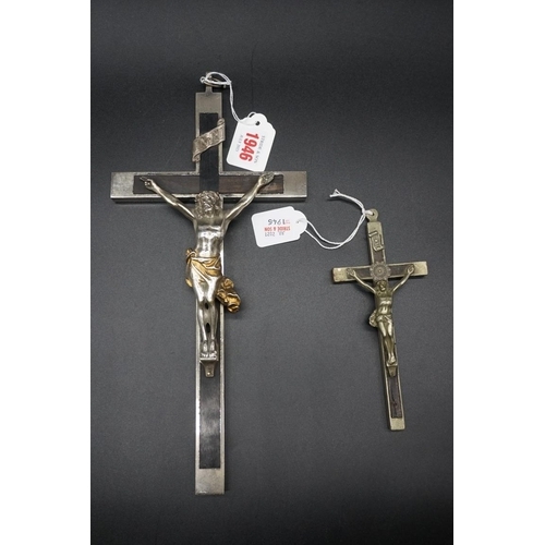 1946 - An ebony and electroplate mounted corpus christi, 33cm long; together with a similar smaller ex... 
