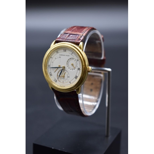 13 - An Audemars Piguet 18ct gold automatic calendar wristwatch with power reserve, case No.C77800, 36mm,... 