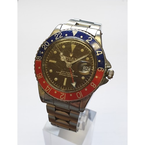 15 - A 1960 Rolex 1675 'Tropical' GMT Master wristwatch, cal 1560, with 'Pepsi' bezel, 78360 Oyster brace... 
