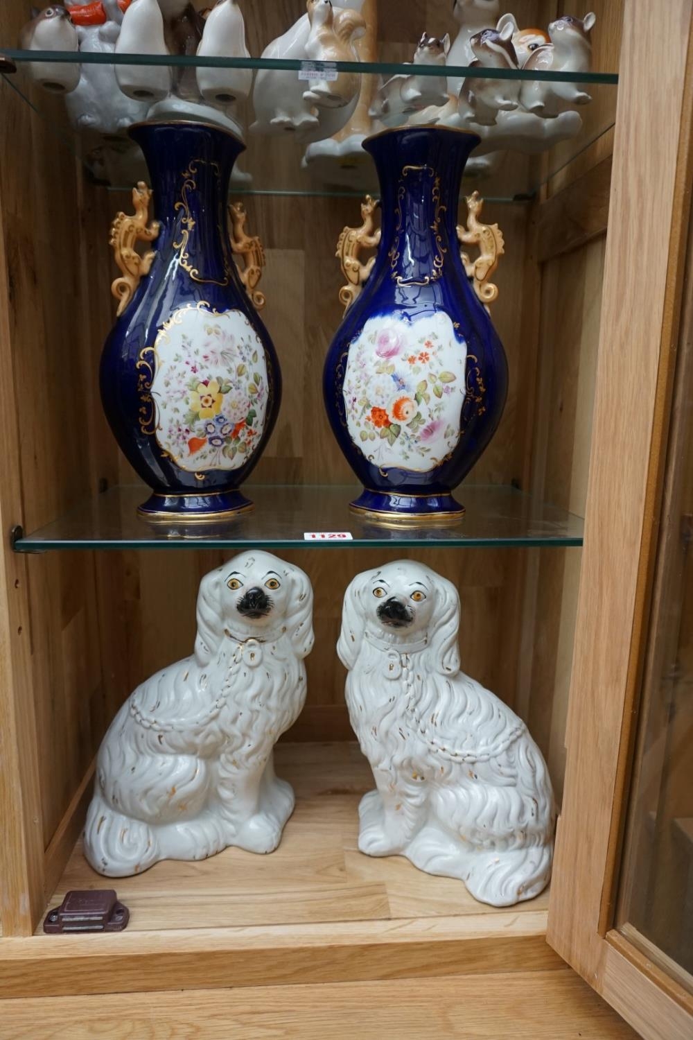 A pair of 19th century porcelain twin handled vases,