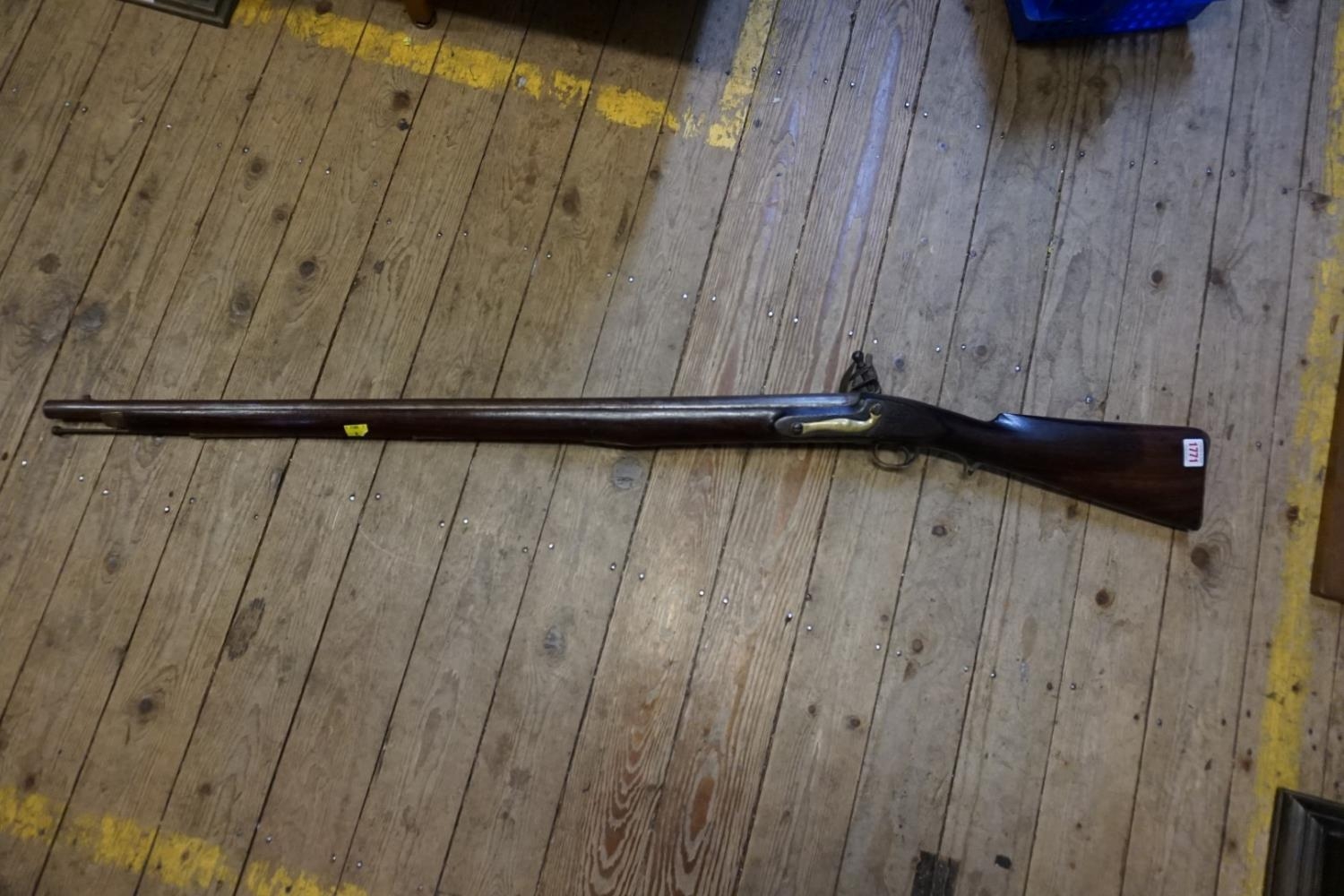 An antique flintlock musket - auctions & price archive