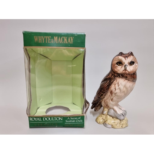 11 - A 20cl Whyte & Mackay Royal Doulton 'Short Eared Owl' whisky decanter, with contents, in oc.... 
