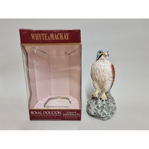 12 - A 20cl Whyte & Mackay Royal Doulton 'Kestrel' whisky decanter, with contents, in oc.... 