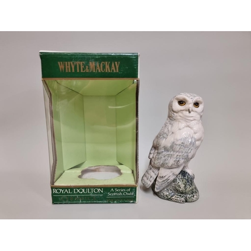 13 - A 20cl Whyte & Mackay Royal Doulton 'Snowy Owl' whisky decanter, with contents, in oc.... 