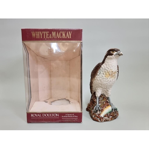 14 - A 37.5cl Whyte & Mackay Royal Doulton 'Osprey' whisky decanter, with contents, in oc.... 