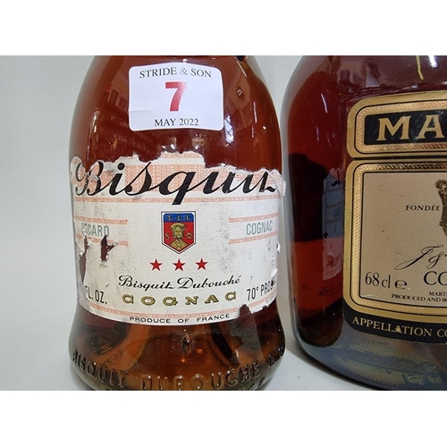 7 - Two old bottles of cognac, comprising: a 68cl Martell; and a 24 fl.oz. Bisquit. (2)