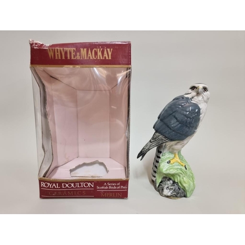 8 - A 20cl Whyte & Mackay Royal Doulton 'Merlin' whisky decanter, with contents, in oc.... 