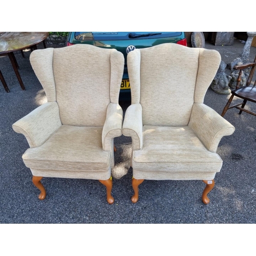 1015 - A pair of Parker Knoll armchairs. 
