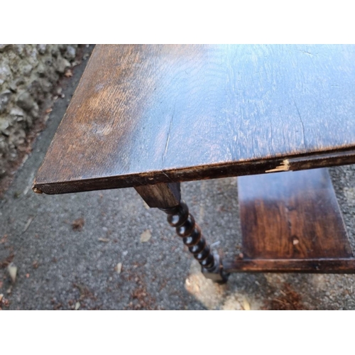 1019 - An oak occasional table, on barley twist legs, 70cm high x 57cm wide. 