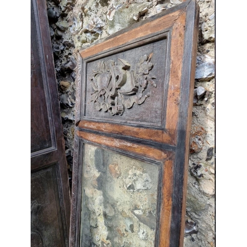 1024 - An antique continental oak two door cupboard, having a pair of glazed doors, 230cm high x 111.5cm wi... 