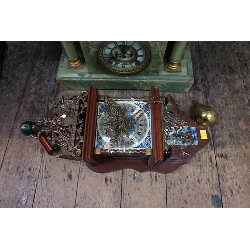 1040a - An onyx mantel clock; together with a Dutch wall clock. ... 