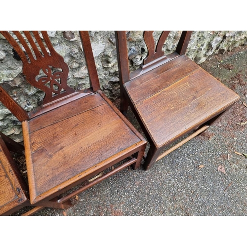 1041 - Three Georgian oak chairs; together with one other. (4)