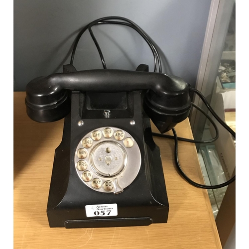 57 - Vintage bakerlite dial telephone with drawer...
