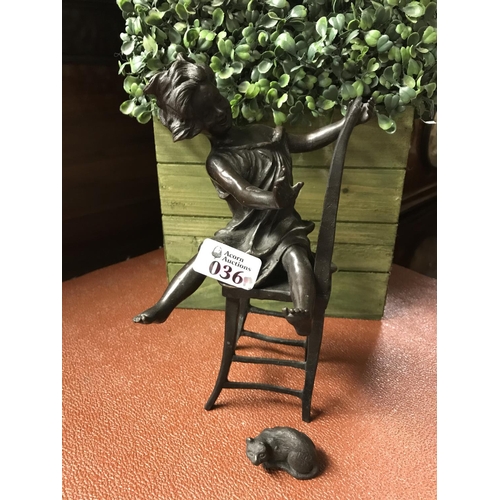 36A - Signed French bronze figure of a young girl in a chair with a cat looking up...