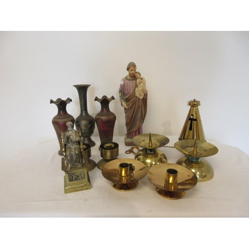28 - A collection of church brass ware and a statue.