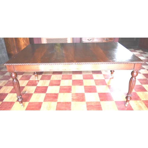 20 - Edwardian style mahogany oblong dining table with rope edge border, on baluster turned reeded legs w... 