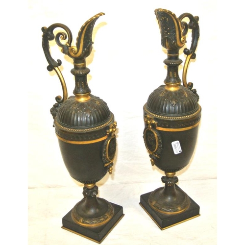 57 - Pair of French Louis XV style ewers with  scroll shaped handles, shaped spouts, decorated with folia... 
