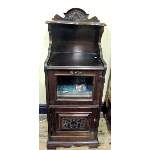 30 - Edwardian mahogany pedestal cabinet with serpentine shaped top, fall down front with bevelled glass ... 