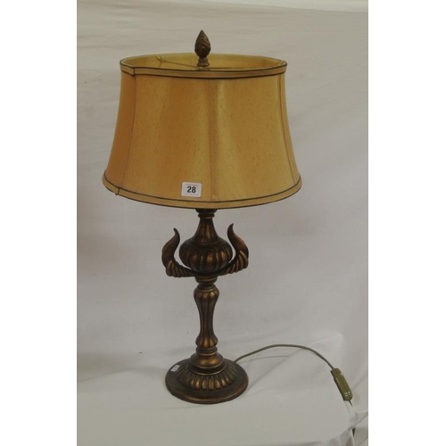 28 - Ornate carved timber electric table lamp, with reeded shaped column and circular base