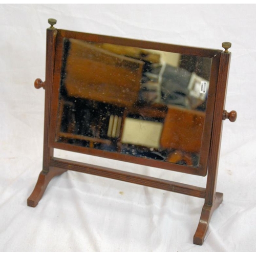 37 - Edwardian mahogany swivel mirror with reeded columns, brass finials, on bracket feet