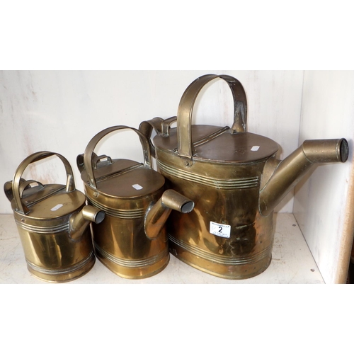 2 - Three Early 20thC graduated watering cans (3)