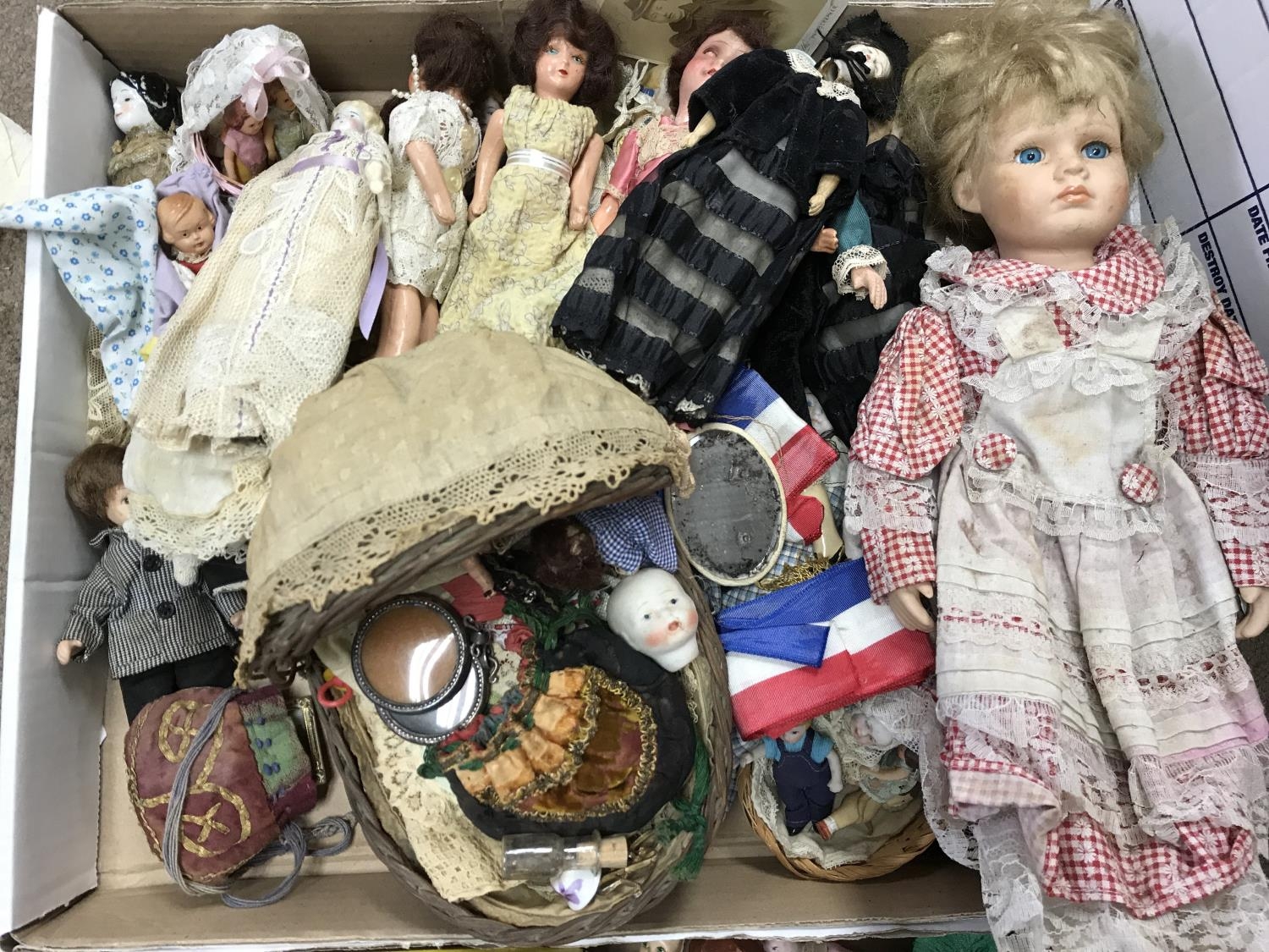2 boxes of antique miniature porcelain and pottery head dolls.