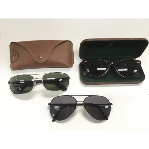 704 - Three pairs of vintage sunglasses.