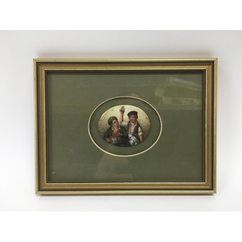 710 - A small framed and glazed porcelain plaque, approx size including frame 20cm x 15cm.
