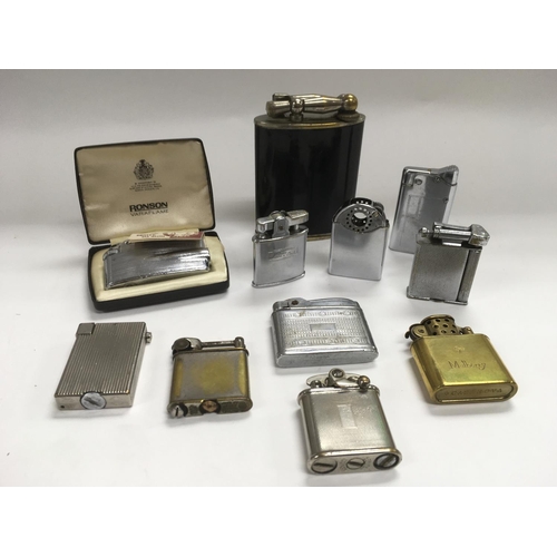 730 - A collection of vintage lighters including a 1930s Calibri kickstart, Ronson examples etc.