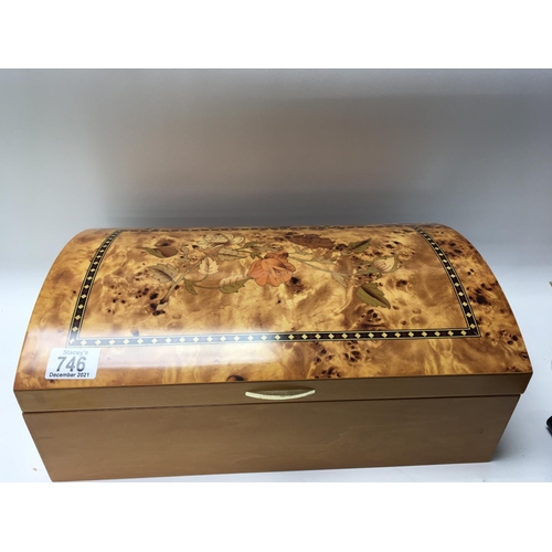 746 - A large dome top jewellery box with marquetry decoration fitted interior. 41cm wide.
