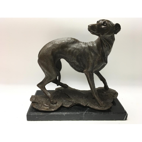 752 - A large bronze greyhound sculpture, after Pierre Jules Mene set on a marble plinth.