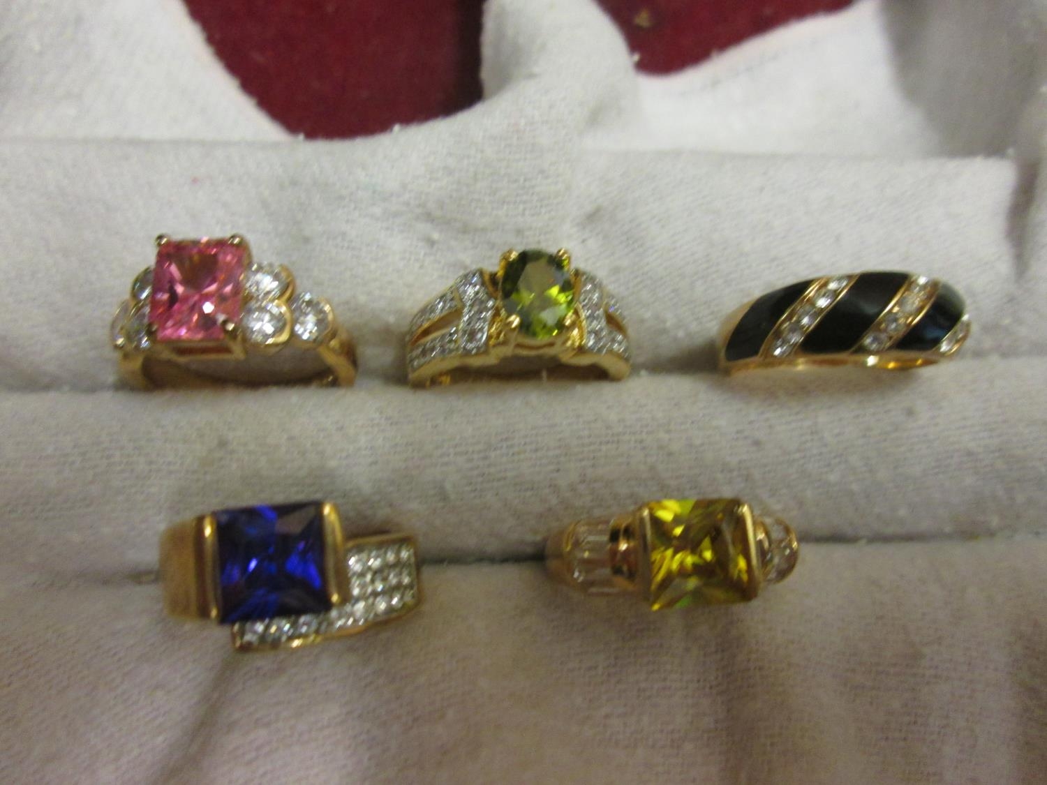 Collection of five gold plated costume rings