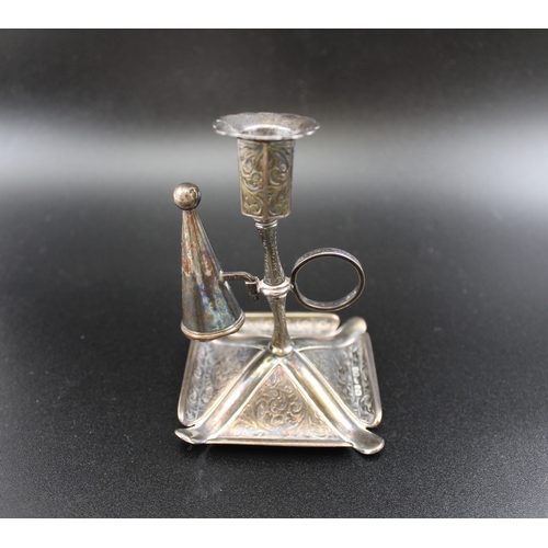 13 - Joseph Willmore, A  Victorian silver taper holder of chamberstick design, with ring handle on square... 