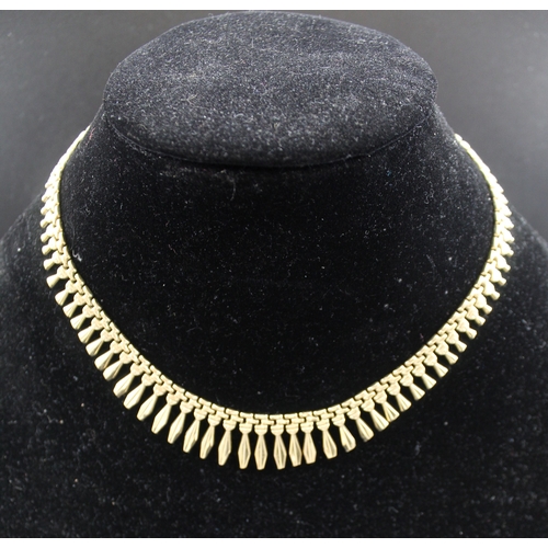 36 - A 9ct gold necklace, graduated decorative link design, 40cm long, 25.3g