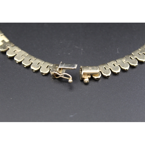 36 - A 9ct gold necklace, graduated decorative link design, 40cm long, 25.3g