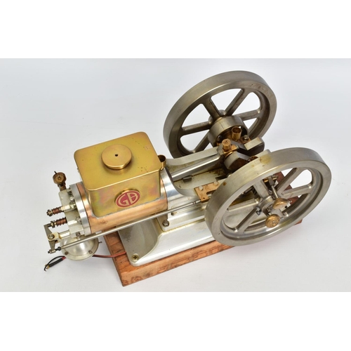 A HANDBUILT MODEL HORIZONTAL SINGLE CYLINDER STATIONARY ENGINE