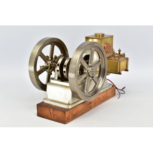A HANDBUILT MODEL HORIZONTAL SINGLE CYLINDER STATIONARY ENGINE