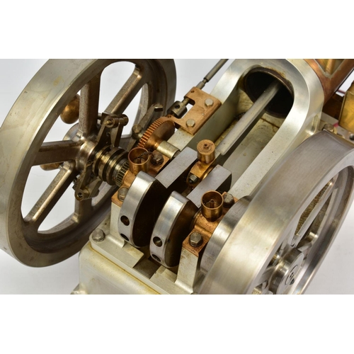 A HANDBUILT MODEL HORIZONTAL SINGLE CYLINDER STATIONARY ENGINE