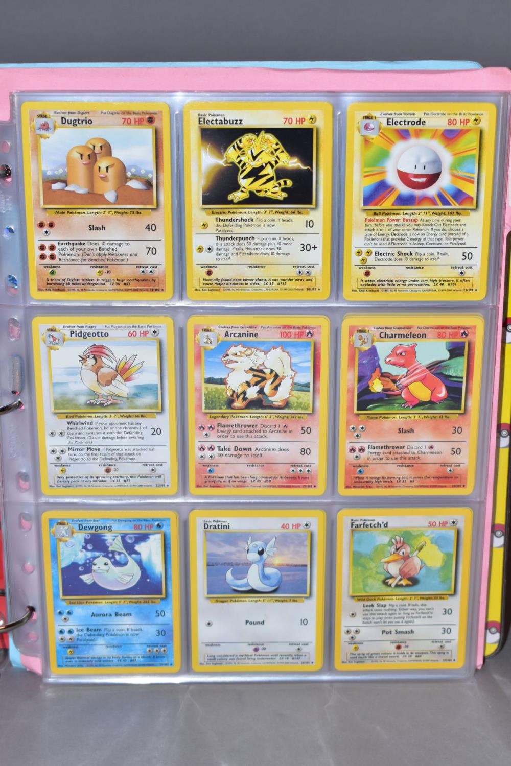 A COMPLETE SET OF POKEMON BASE SET CARDS, and a complete set of Base