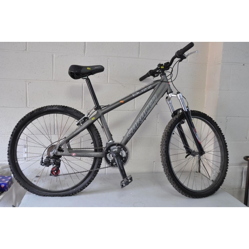 A SARACEN BUZZ MOUNTAIN BIKE with CH580 front suspension 21